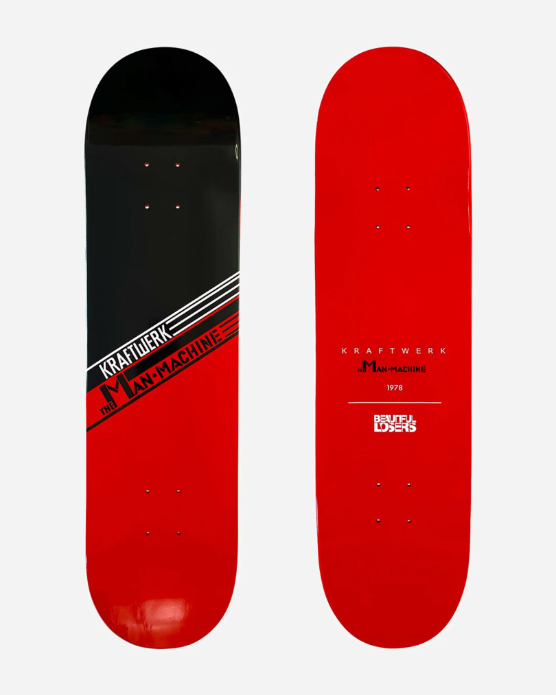 Two skateboard decks from the Kraftwerk Collection are displayed side by side; the left deck features a black and red design with the text "Kraftwerk: The Man-Machine," while the right deck is solid red with text and logos.
