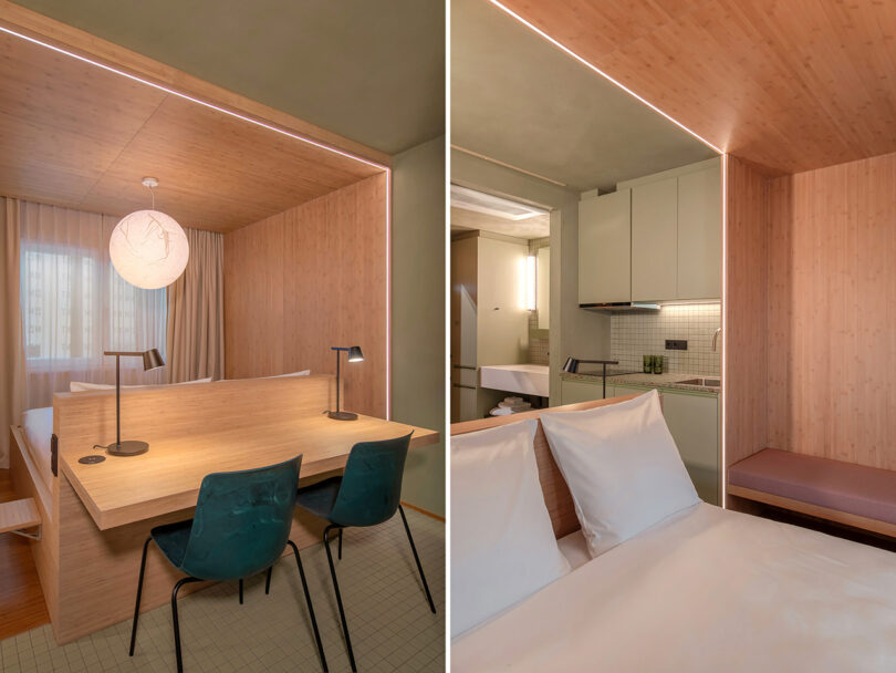 A modern hotel room featuring a bed, desk with two chairs and lamps, a small kitchen, and a bathroom area. Walls are covered in light wood paneling with soft lighting, offering the perfect retreat after exploring the city or attending events at MM:NT Berlin Lab.