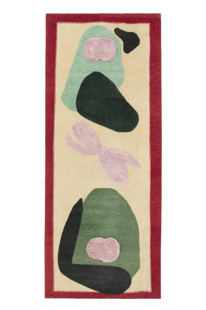 Abstract patterned rug featuring organic shapes in green, pink, and black on a beige background with a red border.