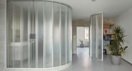A Sculptor’s Apartment With Curved Translucent Glass Walls + No Doors