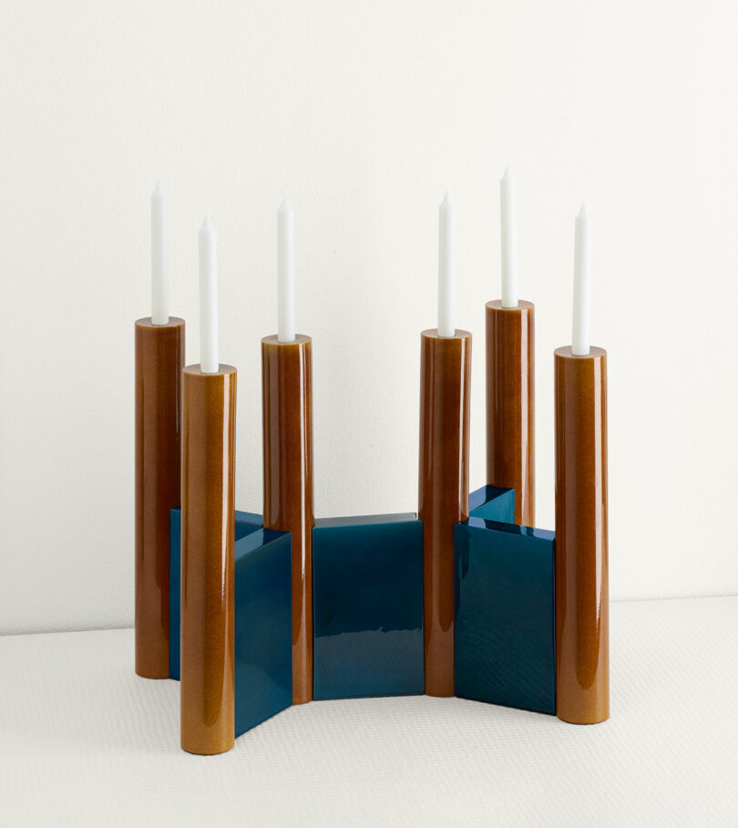 blue and brown candelabra on a white table
