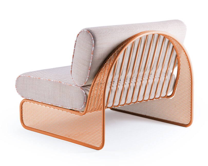A modern couch seat with a curved, perforated metal frame and beige cushioned seat and backrest.