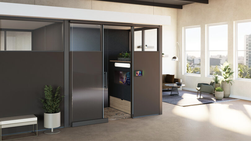 Steelcase and Logitech developed Ocular View video conferencing booth set in an office environment with simulated screen of a participant waiting to connect.