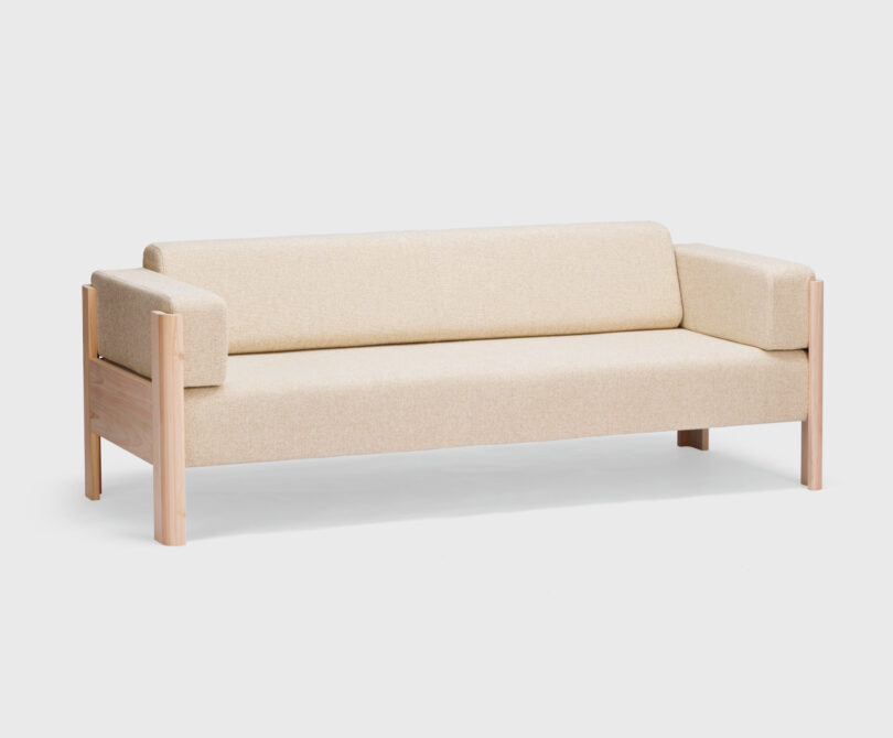 beige and wood sofa