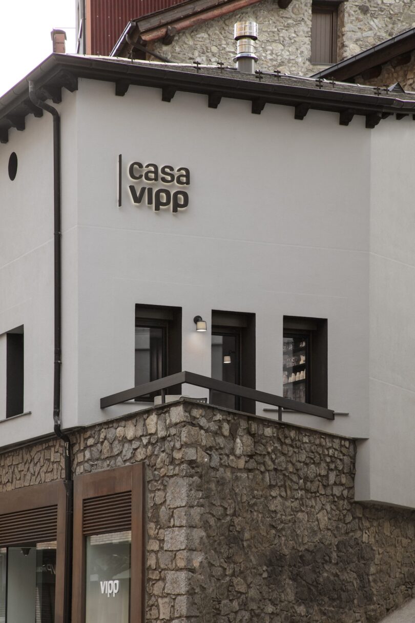 The exterior of Casa Vipp Andorra showcasing its blend of modern and rustic architectural elements