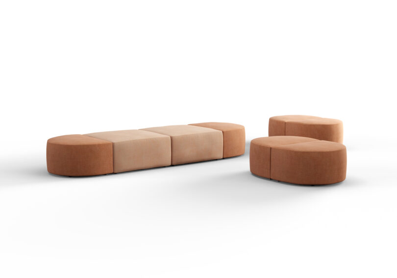 A modular seating set with a long rectangular section and two round sections. All pieces are upholstered in light brown fabric
