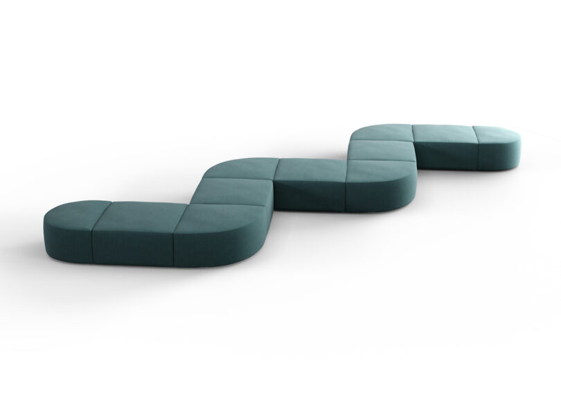 A modular, dark teal sofa with a zig-zag shape consisting of interconnected, curved sections displayed on a white background