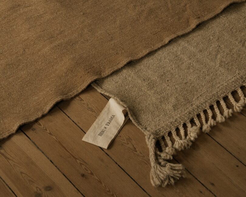 A close-up of two layered Beni rugs from the Terrain collection