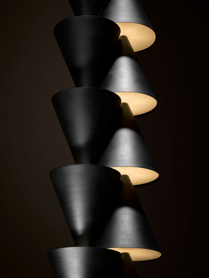 A Legato Double Strings by Luca Nichetto, a double pendant with black and white lamp shade.