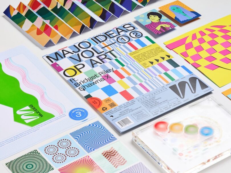 A collection of colorful op art materials, including a magazine titled "Major Ideas Vol. 1 & 2," various geometric designs, and vibrant artwork cards