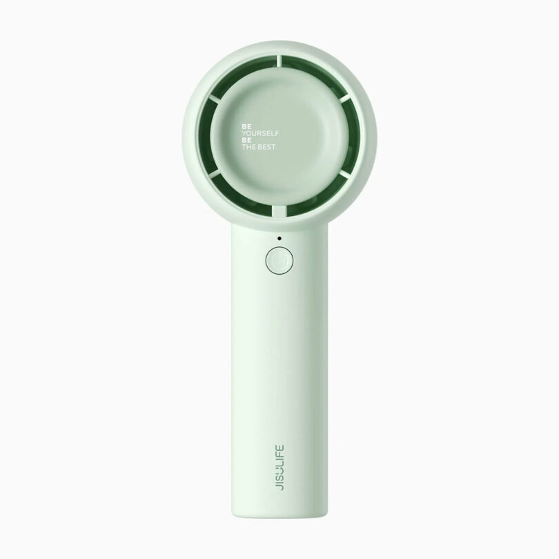 A mint green handheld fan with a circular head and a single button on its handle. The inside of the fan reads, "BE YOURSELF THE BEST.