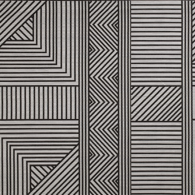 Black and white geometric pattern with various striped shapes, including triangles and rectangles, creating a symmetrical design.