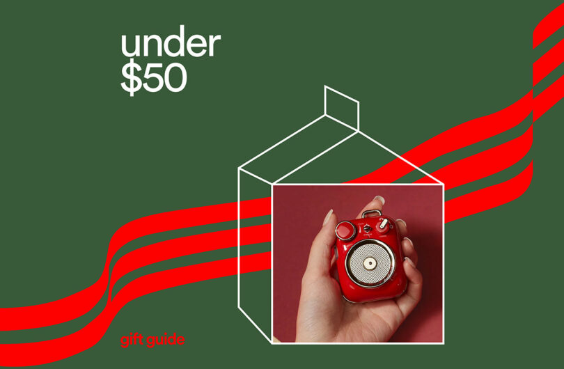 A hand holds a small red retro-style radio against a matching backdrop, highlighting its charm. Perfect for gift guides, this nostalgic piece is surprisingly budget-friendly with its "under $50" price tag.