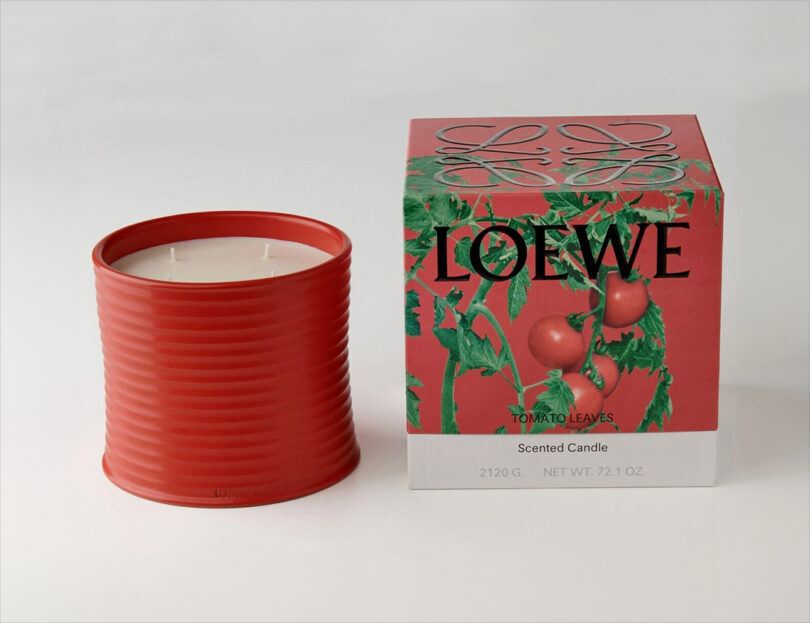 Red ribbed candle and matching box with tomato plant design, labeled "Loewe Scented Candle Tomato Leaves," weight 2120 g, 72.1 oz.