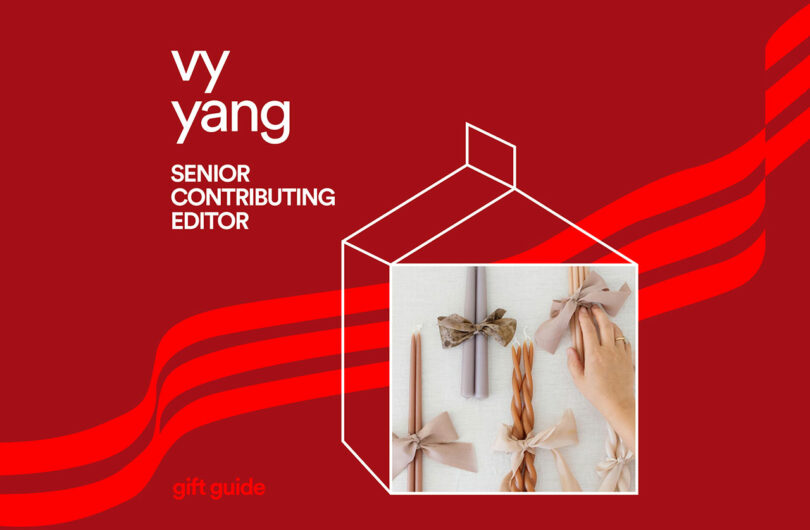 A hand ties a beige bow on wrapped cylindrical gifts atop a white surface. Red background with text: "Vy Yang, Senior Contributing Editor, gift guides expert.