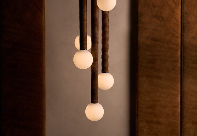 Studio Luddite Stacks Leather Discs to Form the Pell Chandelier