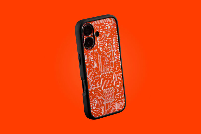 A smartphone case with a red circuit board pattern on an orange background.