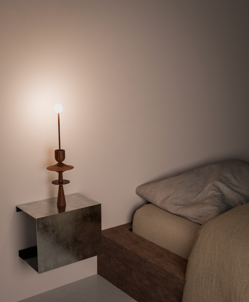 A modern bedside setup with a minimalist lamp on a square metal table beside a bed with beige bedding