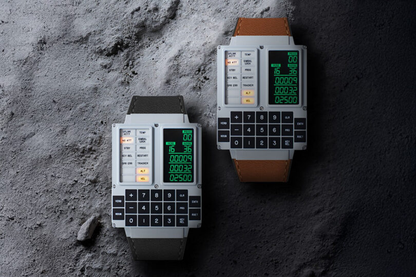 Two digital watches with square faces and calculator keypads, one with a black strap and the other with a brown strap, are displayed on a textured gray surface.