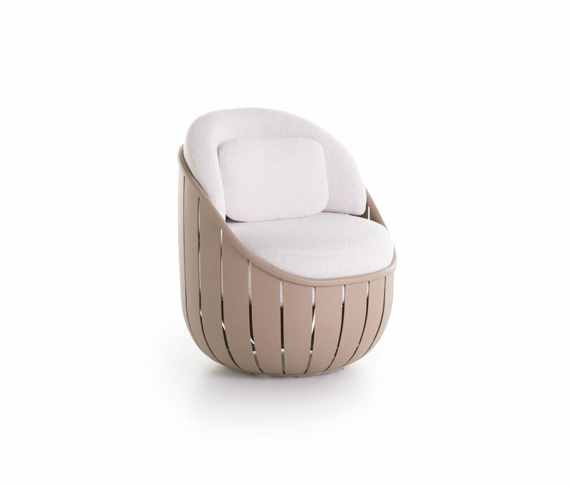 A modern chair with a rounded beige frame and white cushion, against a plain white background.