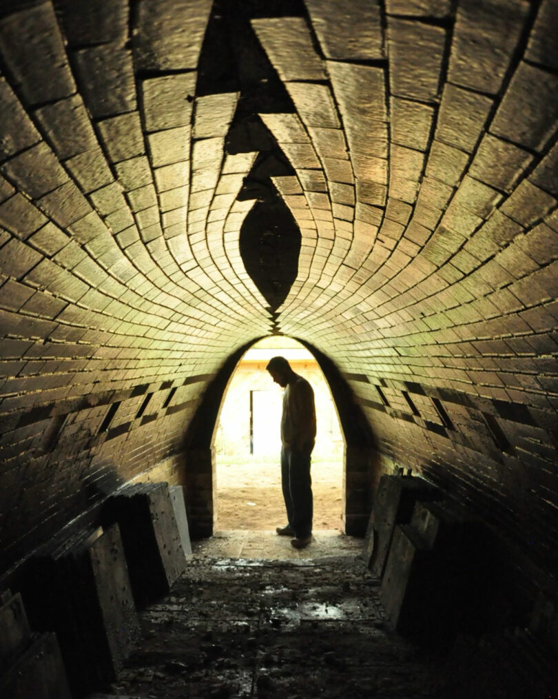 In the silhouette of a person standing inside a brick tunnel, with light visible at the end, there’s an artistry reminiscent of an Alex Matisse masterpiece.