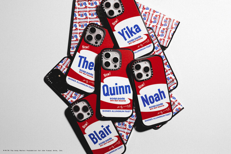 Several phone cases featuring different names and designed like vintage soap pad packaging are arranged in a pile.