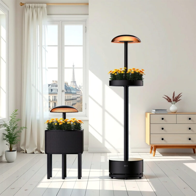 Modern indoor planters with built-in lights, placed in a bright room with a view of the Eiffel Tower through large windows.