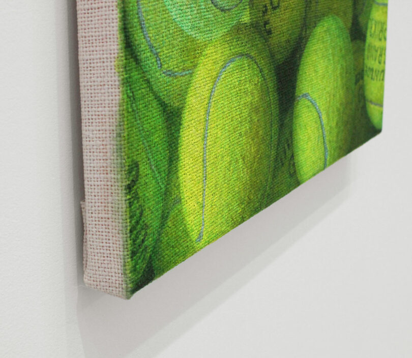 corner of painting depicting tennis balls