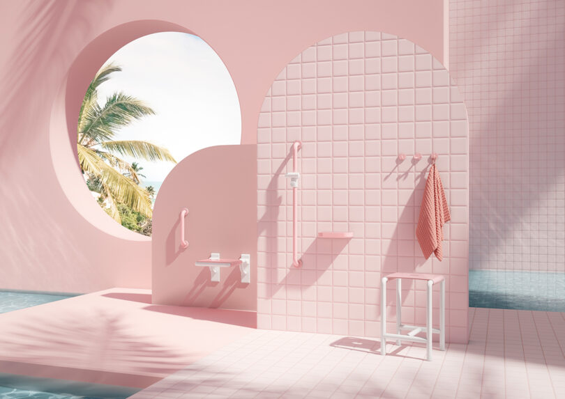 A minimalist pink-tiled bathroom with grab bars, a towel, a stool, and a round window showing a palm tree and blue sky. Sunlight casts soft shadows across the scene.