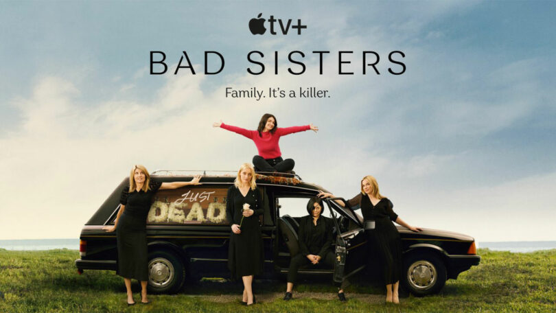Five women pose around and on top of a black hearse with “Just Dead” written on the window. Text above them reads: “Apple TV+ Bad Sisters. Family. It’s a killer.”.