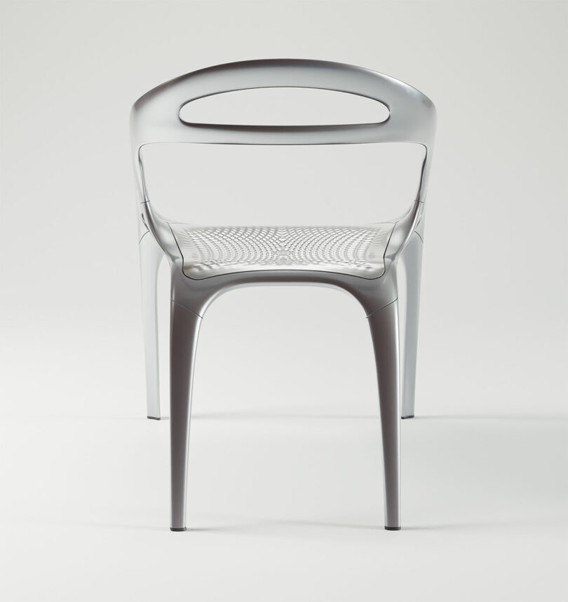 A modern silver PolarisGo chair with a curved backrest and thin legs, viewed directly from the front against a plain light background.