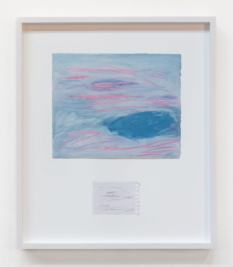 Blue drawing over torn notepad paper in single frame