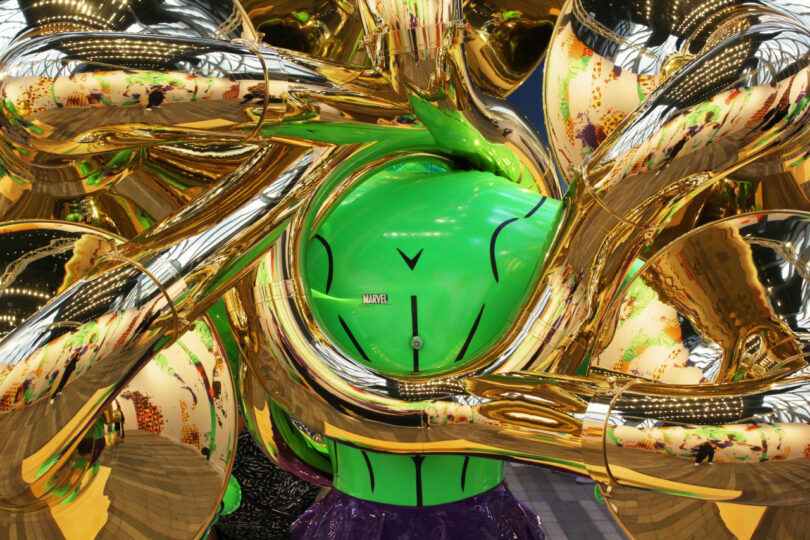 Back of sculpture with reflections in brass tuba