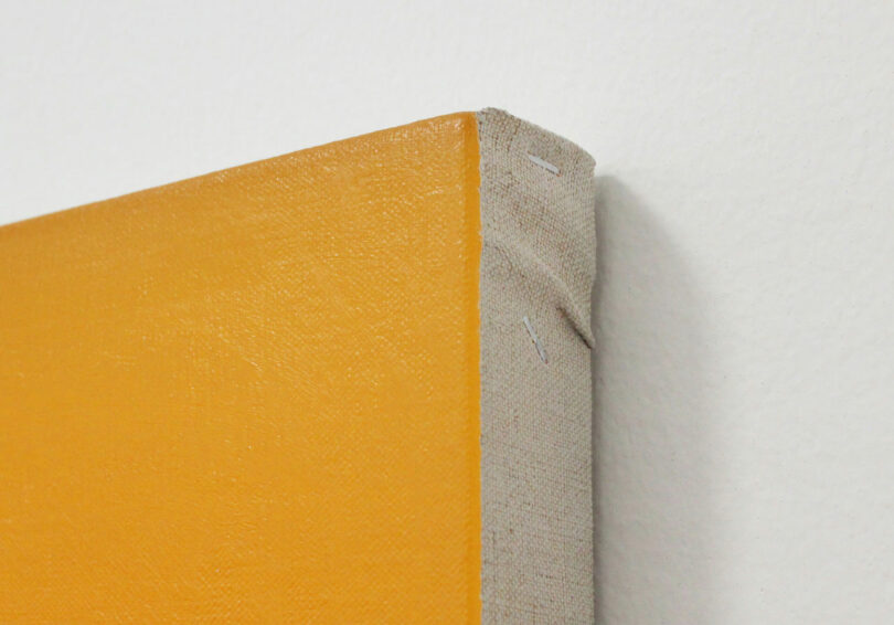 Corner of monochrome orange painting