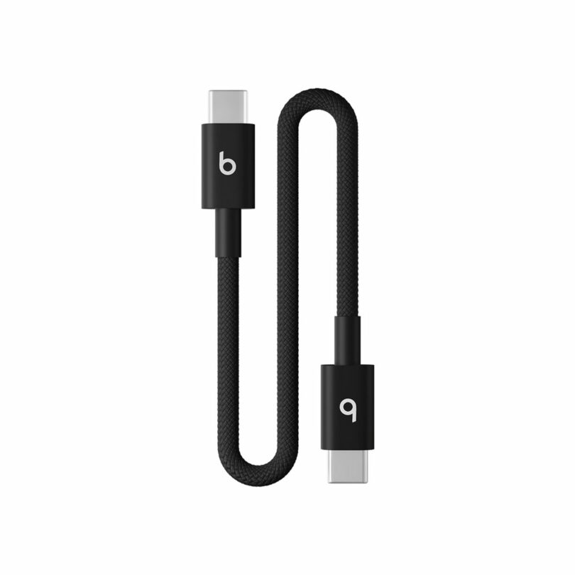 A short black braided Beats USB-C to USB-C cable with "b" and "q" logos on each connector, displayed on a white background.