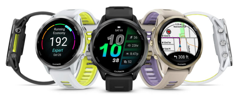 Four Garmin smartwatches are displayed side by side, each showcasing different screens including running metrics, time, and advanced Garmin GPS mapping.