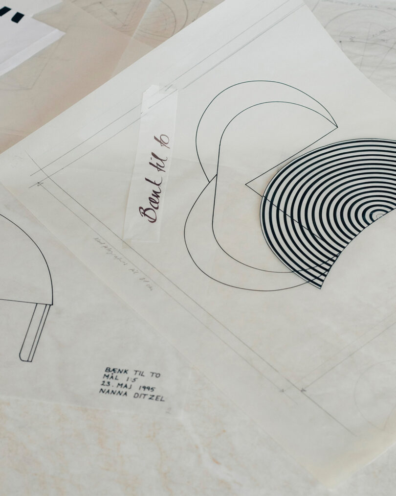 Architectural sketches and geometric line drawings on tracing paper sheets, with handwritten notes and a date.