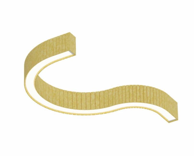 Curved, gold-colored LED light fixture with a segmented surface, viewed against a plain white background.