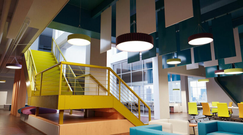 Modern office interior with yellow staircase, hanging ceiling panels, round lights, and colorful chairs and sofas. Large windows provide city views.