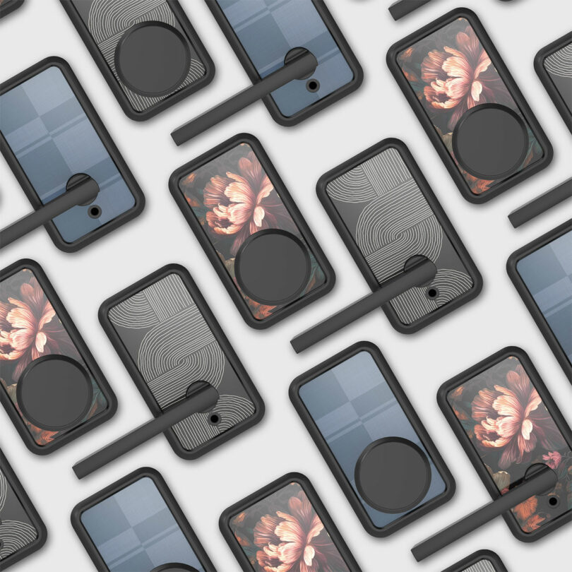 Multiple smartphones in black cases with unique back designs, including abstract lines, blue patterns, and floral prints, are arranged in a diagonal grid pattern on a light surface—each case as distinctive as a Pin & Tumbler Schlage lock.