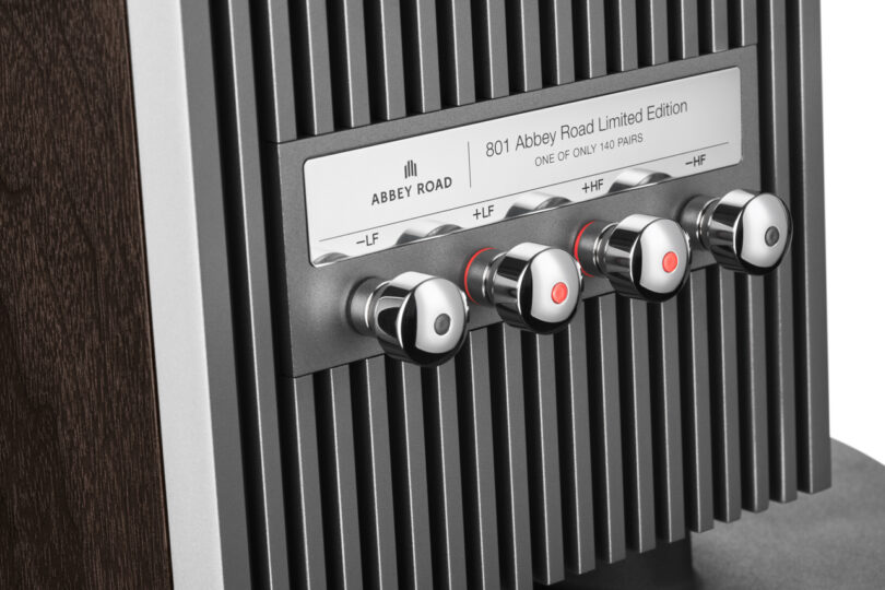 Close-up of four chrome Bowers & Wilkins control knobs on a ribbed metal panel labeled "801 Abbey Road Limited Edition, One of Only 140 Pairs" with "+LF," "–LF," "+HF," and "–HF" markings.