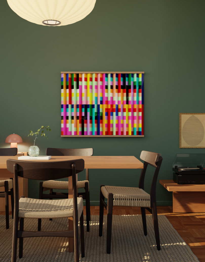 A dining area with a wooden table, four chairs, a green wall, abstract colorful artwork, a record player, and modern lighting