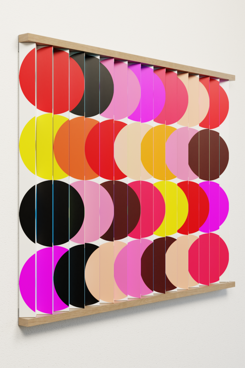 A wall-mounted artwork featuring a grid of vertical panels with half circles in various bright colors, including red, yellow, pink, black, and brown, on a white background