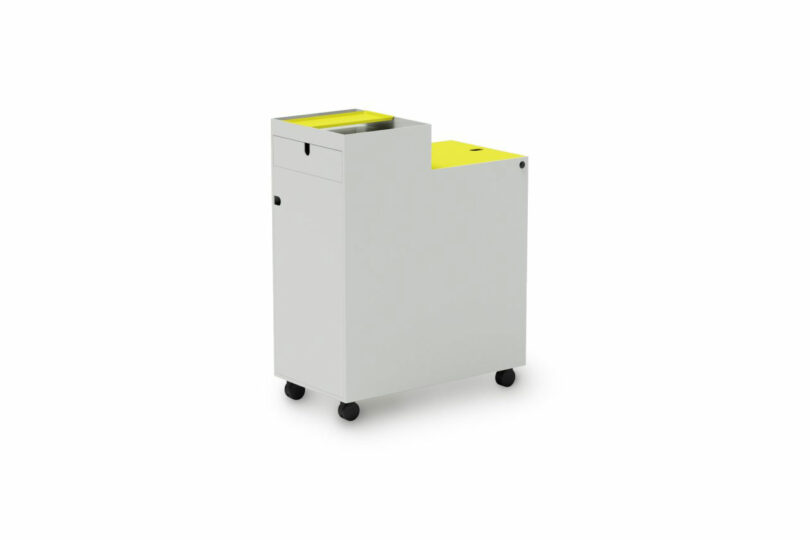 A small, white rolling cabinet with a yellow top section and drawer, designed for storage and mobility.