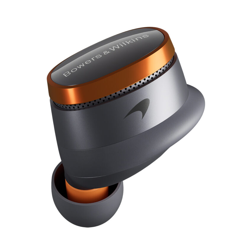 A single gray and orange wireless earbud featuring the Bowers & Wilkins brand name on top and a small logo on the side.
