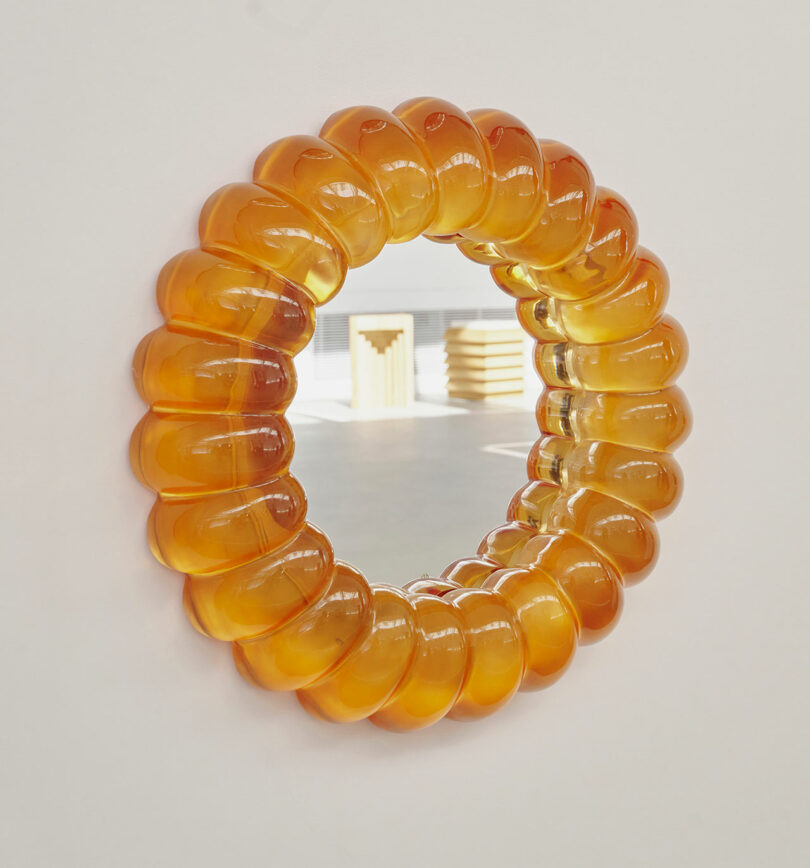 orange resin mirror reminiscent of jelly