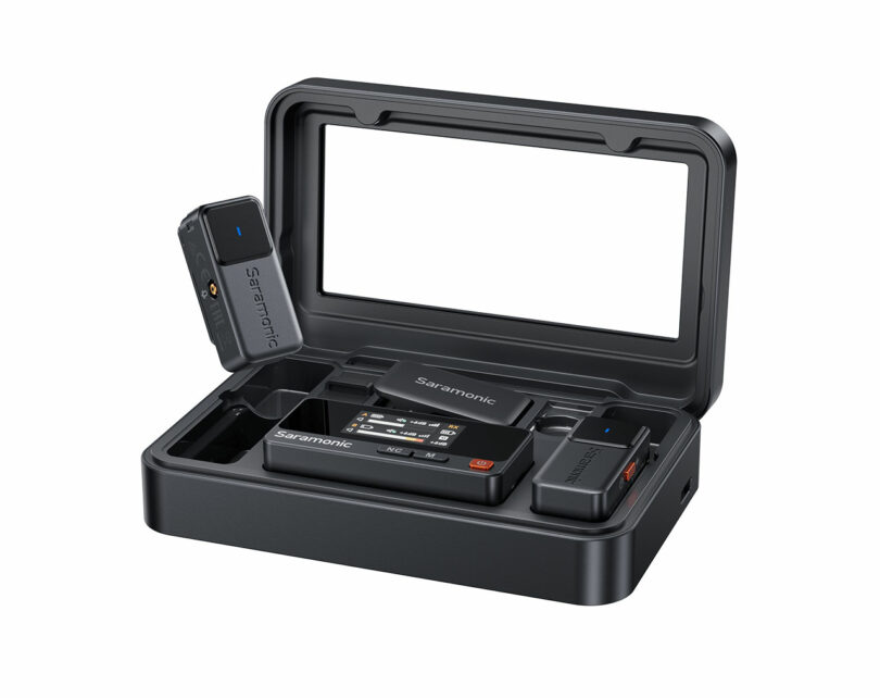 The Saramonic Air wireless microphone kit features two transmitters, one receiver, and a charging case, all labeled Saramonic and displayed against a white background.