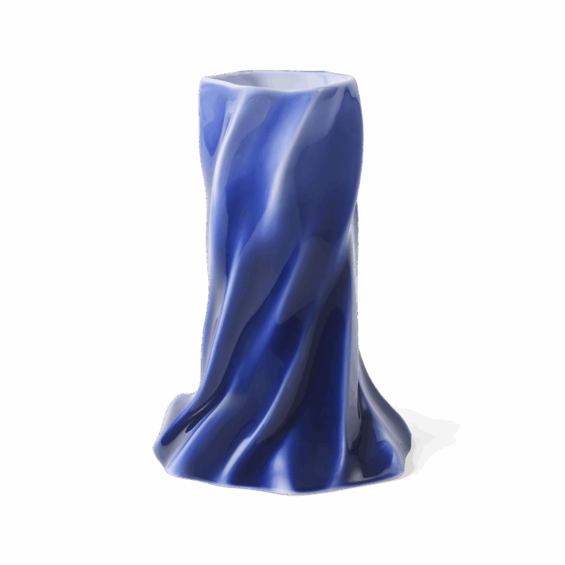 A shiny, deep blue sculpted vase with smooth, flowing folds resembling ocean waves, standing upright against a white background.