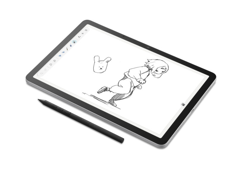 A digital tablet with a stylus displays a black and white sketch of a running character and a simple bunny face.