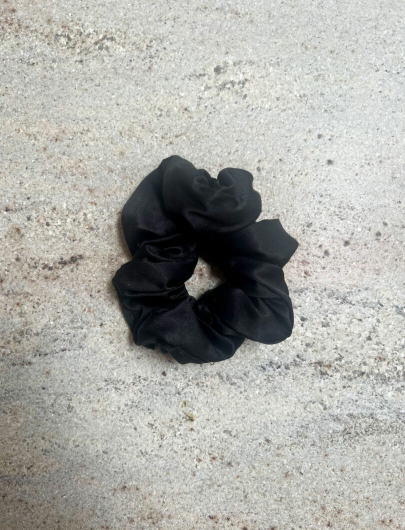 Hiding the black fabric designed by Nicki Gitlin lies on the light, stain.